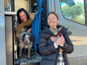 Honz with new mom and dad and small dog