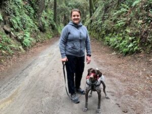 Marty with his new mom on a fern-lined hiking trail