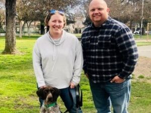 Keene with his new mom and dad