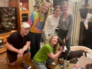 Oso with his new forever family.