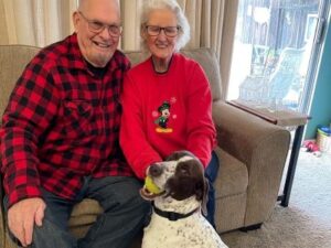 Franco with his new mom and dad.