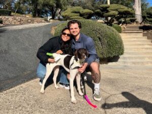 Natalie with her new mom and dad.