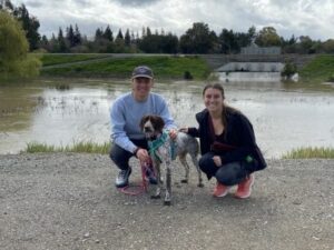 Charlotte with her new mom and dad.