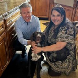 Cooper Ace with his new mom and dad.