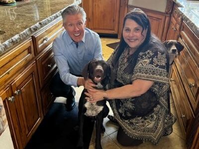 Cooper Ace with his new mom and dad.