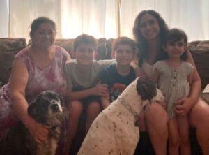 Isabella with her new forever family.