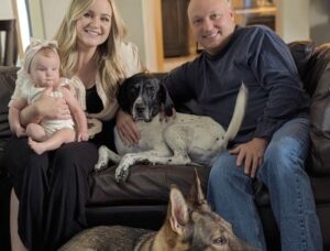 Ollie with his new forever family.