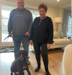 Coupe with his new forever Mom and Dad.
