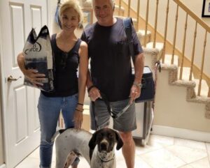 Donovan with his new forever Mom and Dad.