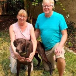 Brownie with his new forever Mom and Dad.