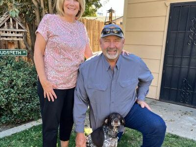 Heidi with her new forever Mom and Dad.