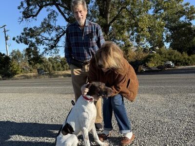 Gunney with his new Mom and Dad.