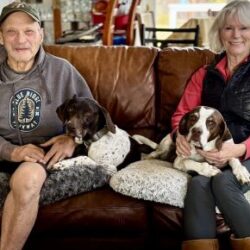 Maddie with her new Mom and Dad, and K9 sibling.