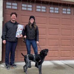 Alfie with his new Mom and Dad.