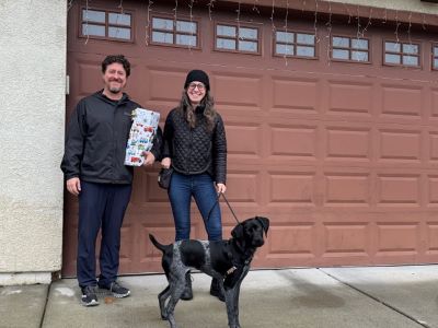 Alfie with his new Mom and Dad.