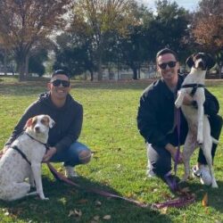 Paige with her new forever Dads, and new canine sister.