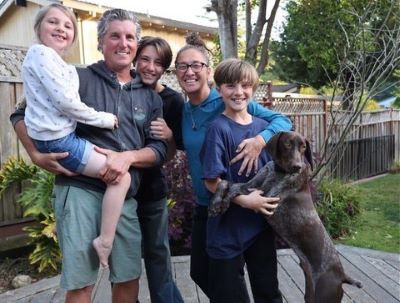 Kio with his new forever family.