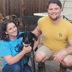 Picture of Iris with her new forever Mom and Dad.