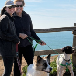 Abe with his new family standing by the sea