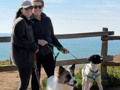 Abe with his new family standing by the sea