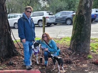 Belle with her new Mom and Dad.