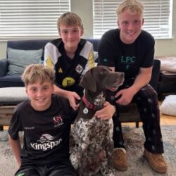 Elliot with his new human brothers.