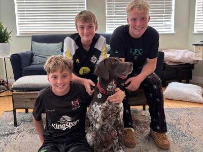 Elliot with his new human brothers.