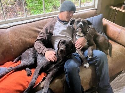 Jagger with his new Dad and fur brother.