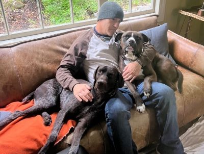 Jagger with his new Dad and fur brother.