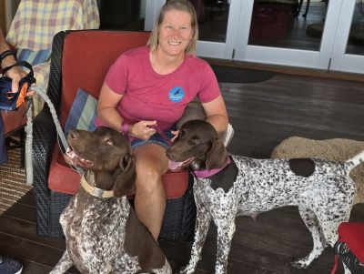 Laney with her new Mom and fur brother.